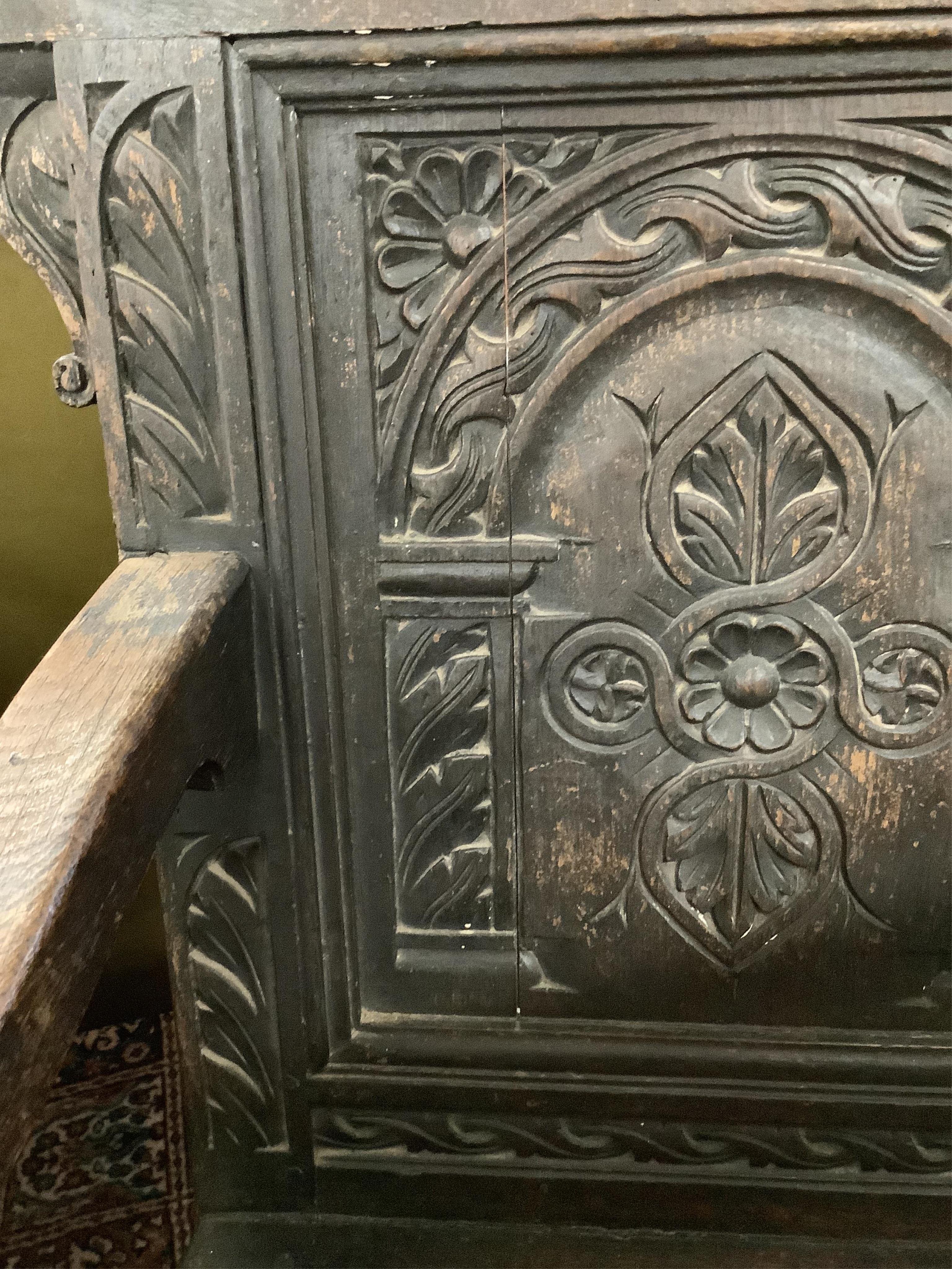 A 17th century oak wainscot type chair, width 61cm, depth 49cm, height 110cm. Condition - fair